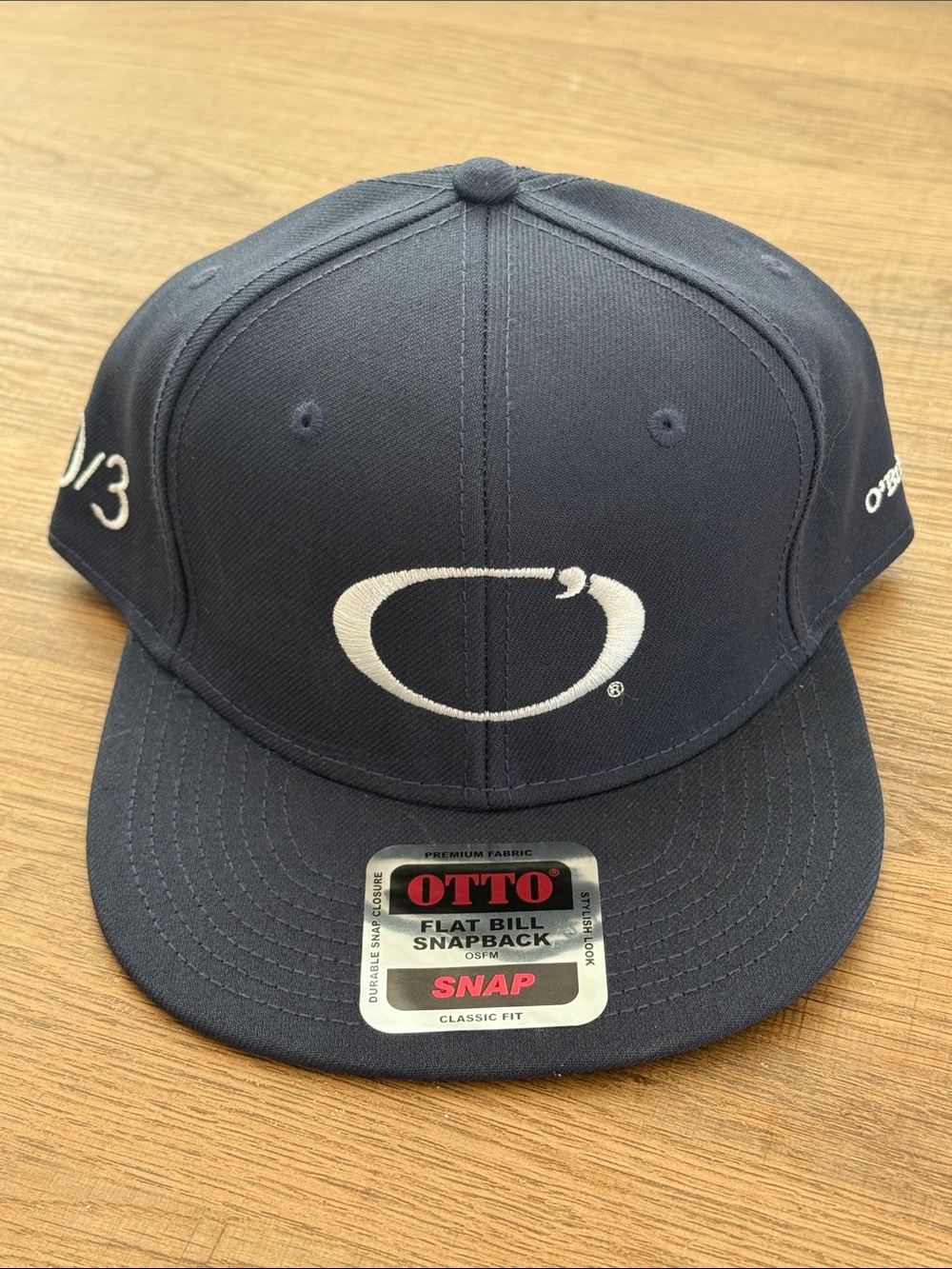Otto Navy Blue Snapback Hat with White O Logo